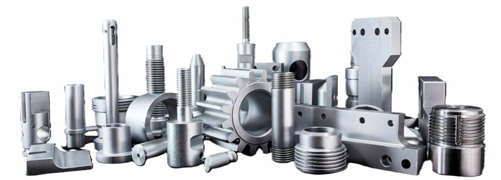 Różnorodne elementy metalowe wykonane z aluminium przy użyciu technologii CNC, gotowe do zastosowania w przemyśle.