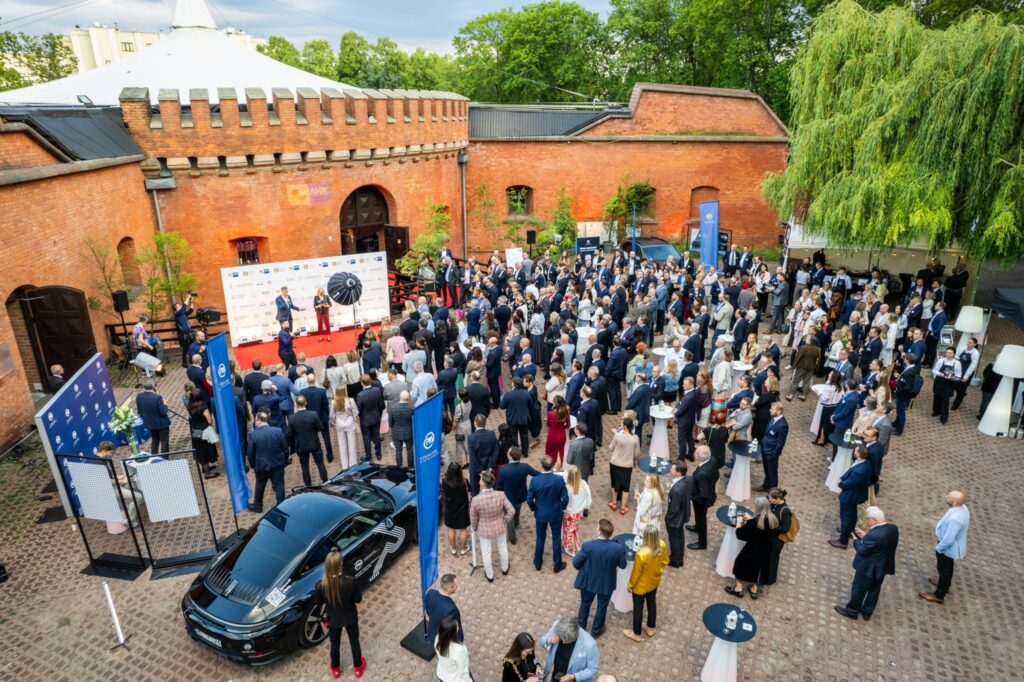 Participants of the AHK Poland Summer Evening 2026 during a business event in Warsaw